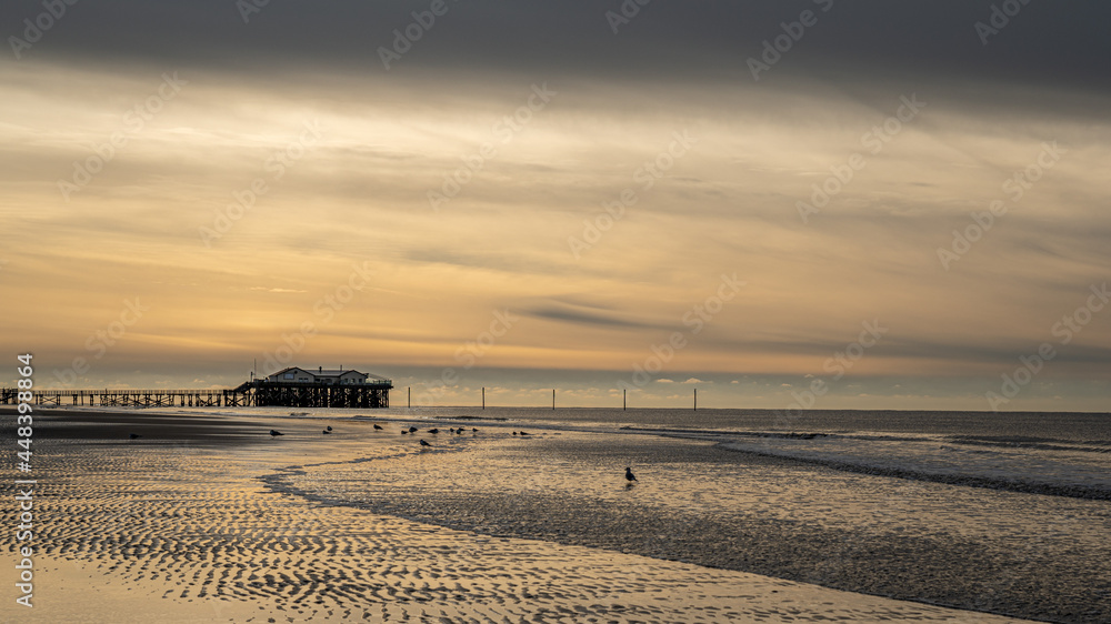Fototapeta premium Sankt Peter Ording Strand Sonnenuntergang