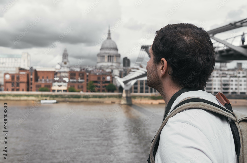 London UK - August 1st 2021: St Paul's Cathedral and Millenium bridge in London during a cloudy day