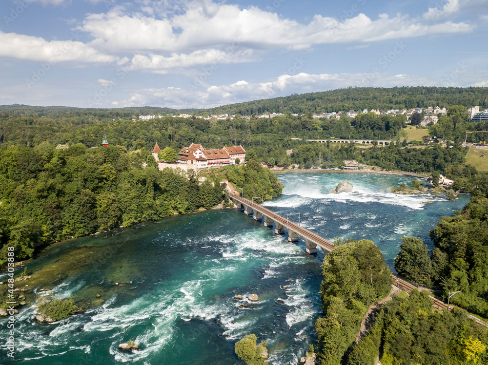 Aerial photography with drone of Rhine Falls with Schloss Laufen castle, Switzerland. Rhine Falls is the largest waterfalls in Europe