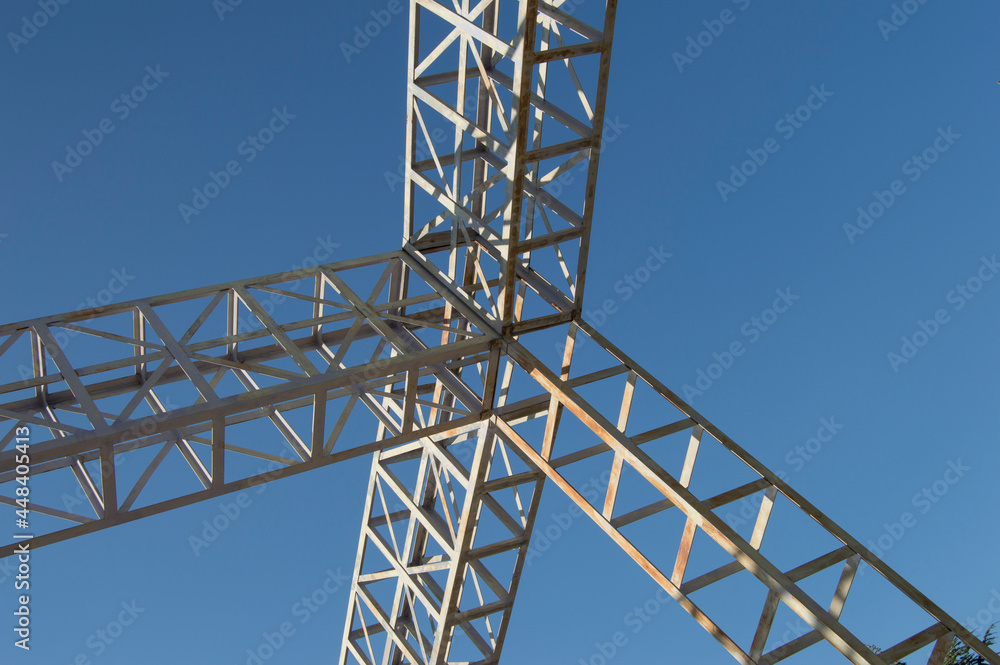 metal wireframe isolated on blue sky background in a park metal wireframe isolated on blue sky background in a park