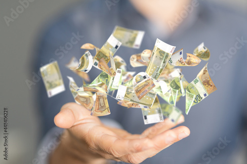 euro bills flying around  i...