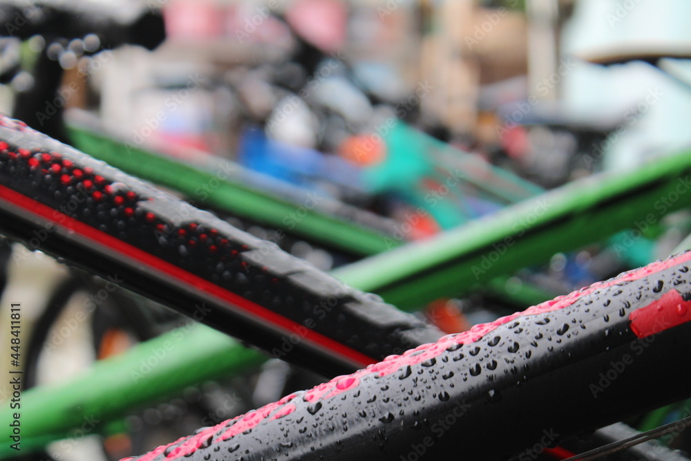 bicycles covered in raindrops