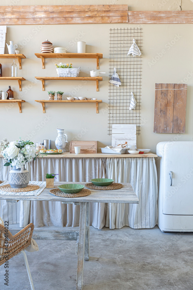 simple cozy home interior of an open plan ordinary room with a kitchen and bedroom area simple cozy home interior of an open plan ordinary room with a kitchen and bedroom area