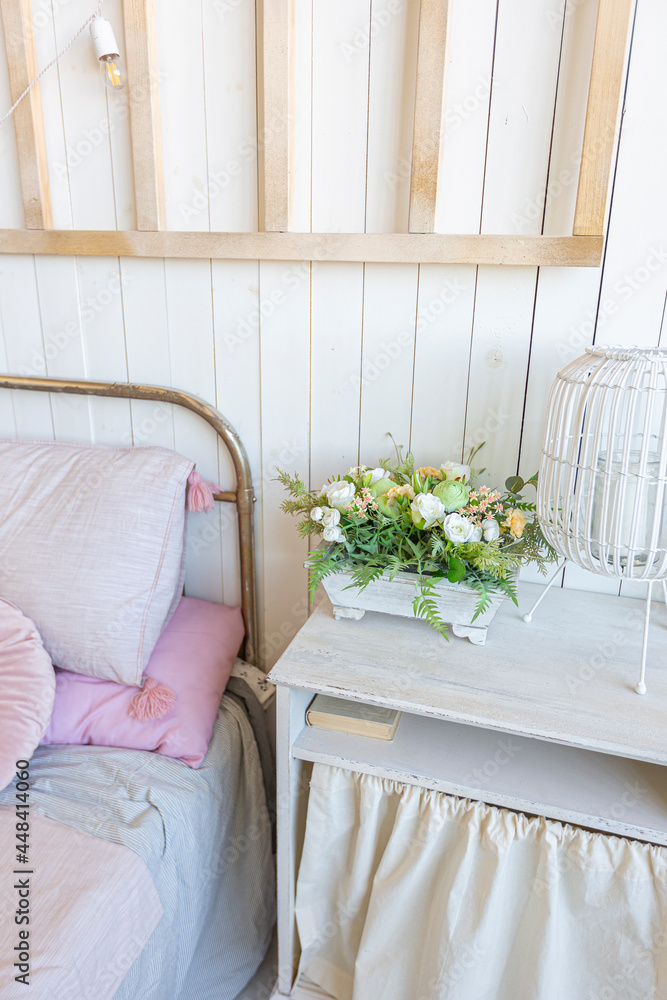 simple cozy home interior of an open plan ordinary room with a kitchen and bedroom area simple cozy home interior of an open plan ordinary room with a kitchen and bedroom area