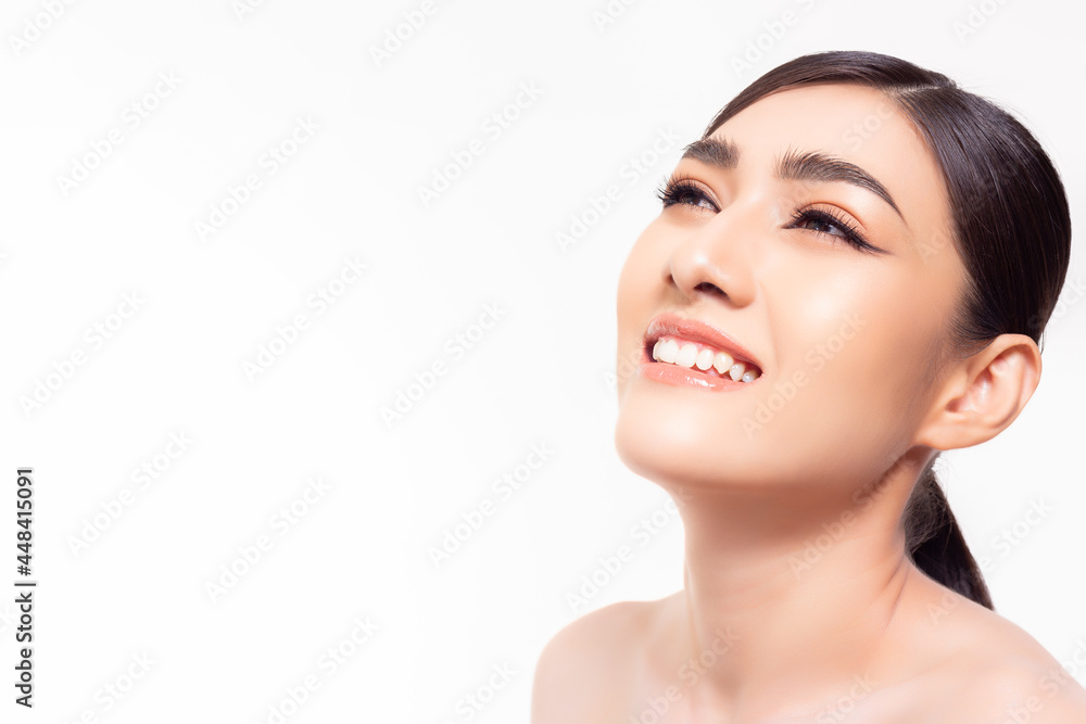 Happy beautiful young girl showing beauty face with natural make up looking to copy space Pretty asian woman clean fresh skin Expressive facial expression Cosmetology beauty and Spa concept copy space Happy beautiful young girl showing beauty face with natural make up looking to copy space Pretty asian woman clean fresh skin Expressive facial expression Cosmetology beauty and Spa concept copy space