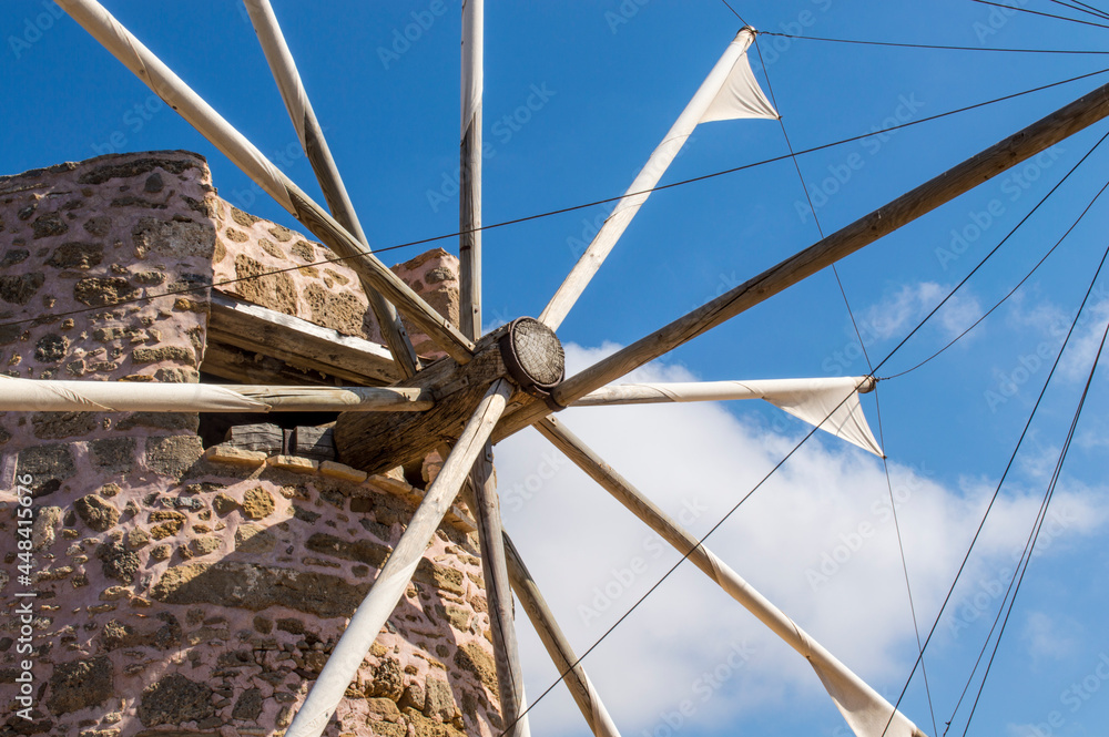 Obraz premium sunny windmill of stone and wood