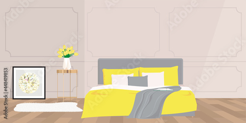 Bedroom interior with a classic wall with a yellow bedspread.