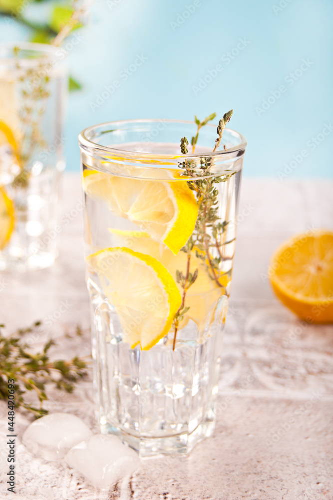 Summer cold fresh lemonade with herb thyme and lemon