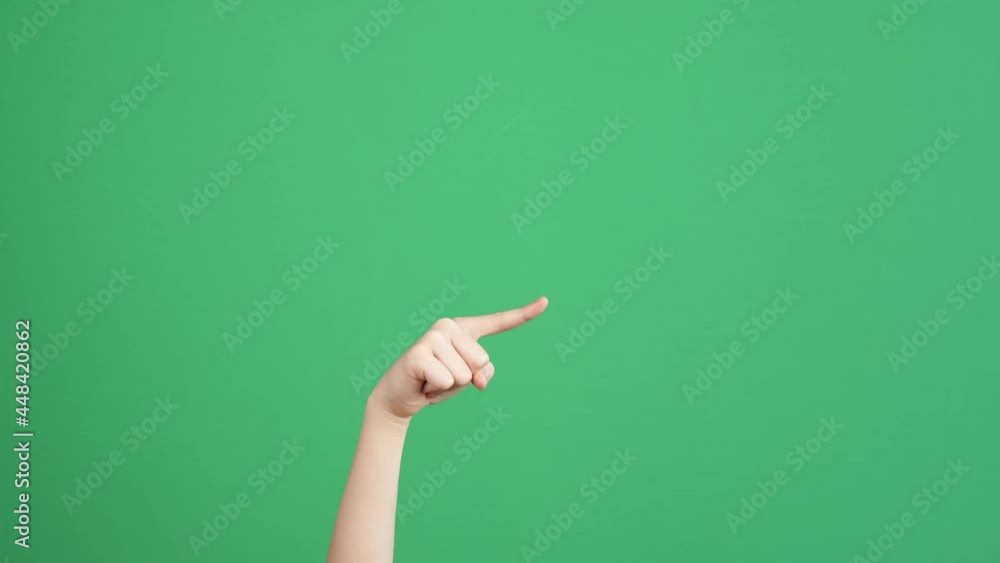 Kid hand pointing at someone or something, counting and show two hands thumbs up over green screen chroma key background. 4k video Kid hand pointing at someone or something, counting and show two hands thumbs up over green screen chroma key background. 4k video