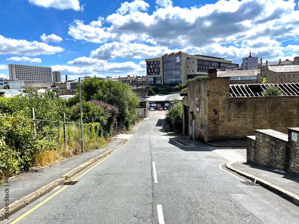 View down, Tetley Street, with derelict buildings and trees, in the city of, Bradford, Yorkshire, UK
