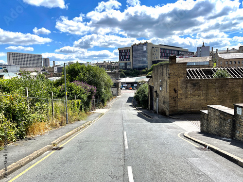 View down, Tetley Street, with derelict buildings and trees, in the city of, Bradford, Yorkshire, UK