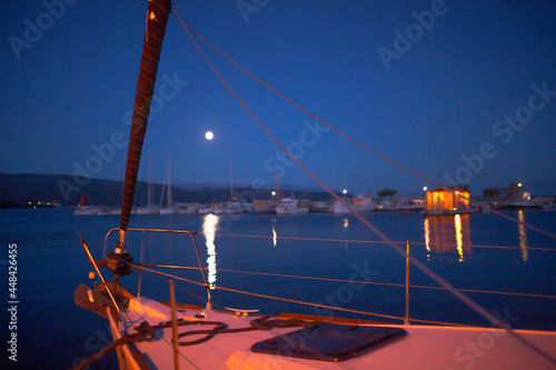Evening view of Krk Harbor and marina in medieval old town Krk. Mooring yachts, boats and other vessels on the pier. A summer vacation in a Croatian islands at Adriatic sea. Island Krk, Croatia.