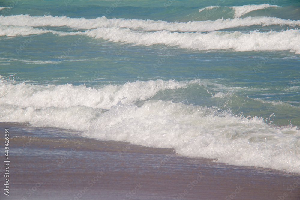 Waves crash on the shore of Lake Michigan at Indiana Dunes National Park.