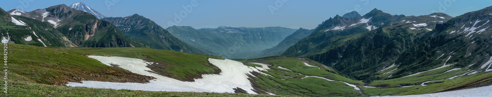 Panoramic view of the hills and volcanoes of Kamchatka Peninsula, Russia. Panoramic view of the hills and volcanoes of Kamchatka Peninsula, Russia.