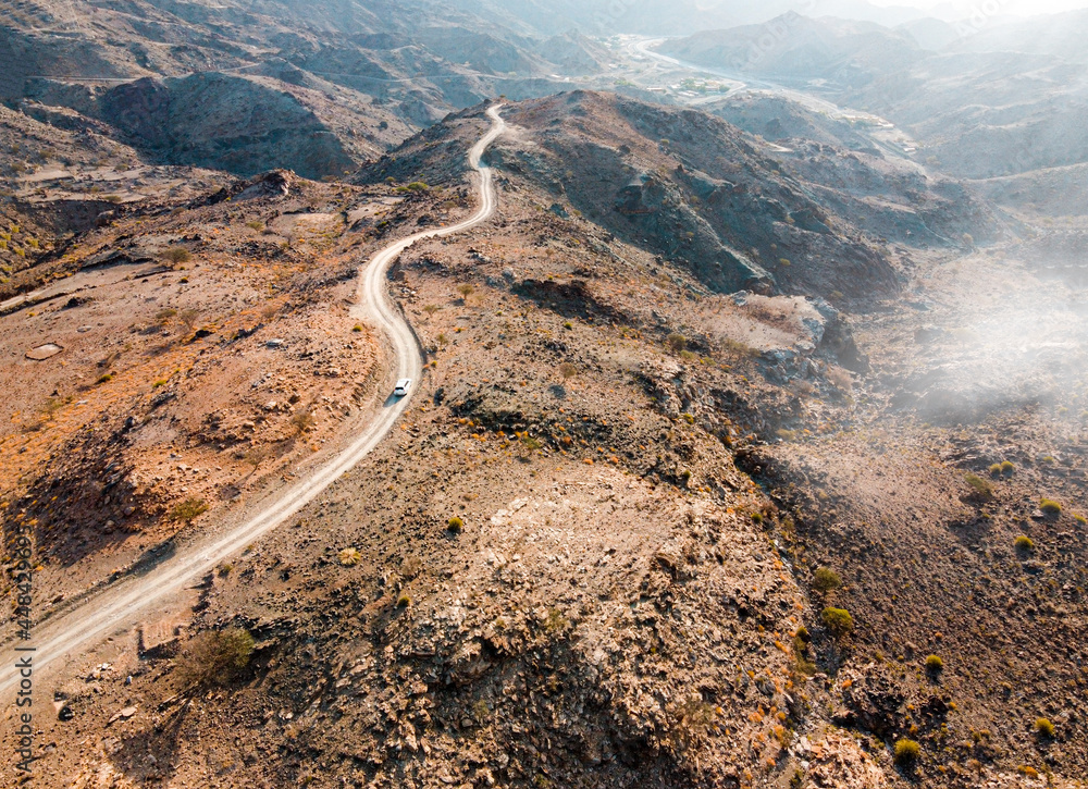 Drone shot of a mountain road.