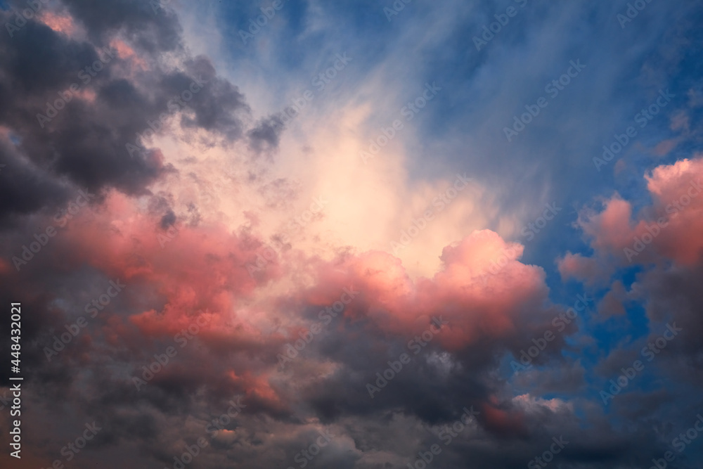 Abstract nature background. Dramatic and moody pink, purple and blue cloudy sunset sky. Red cloudscape area. Bright mood wallpaper. Heaven. Colorful backdrop. After storm. Springtime. Cumulus clouds
