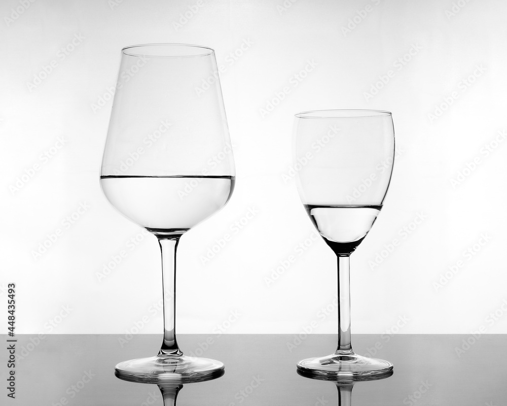glass cups with water in black and white 