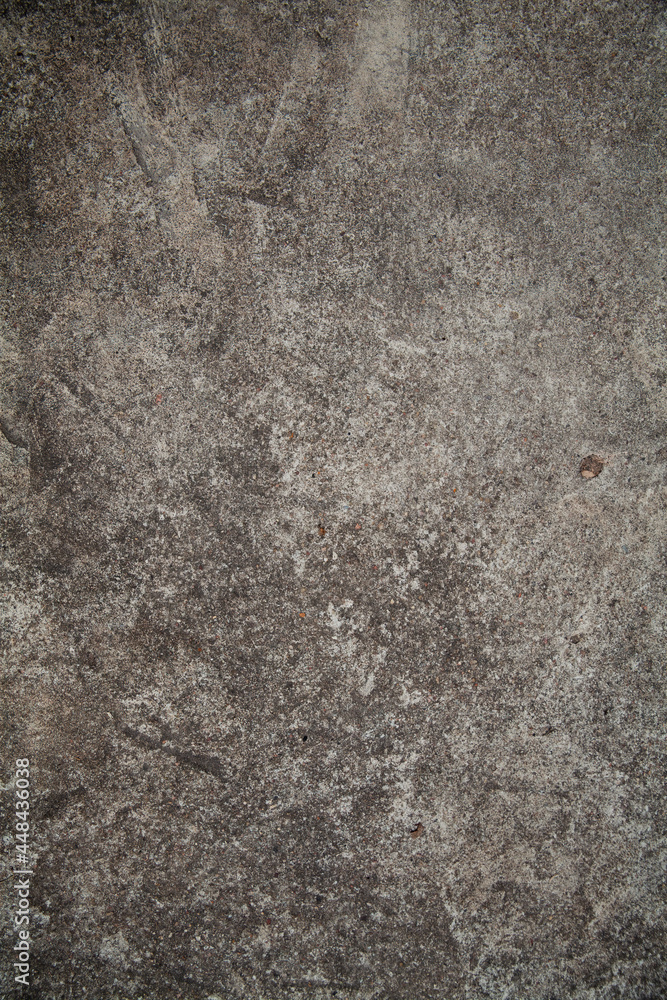 The texture of old concrete with small stones The texture of old concrete with small stones