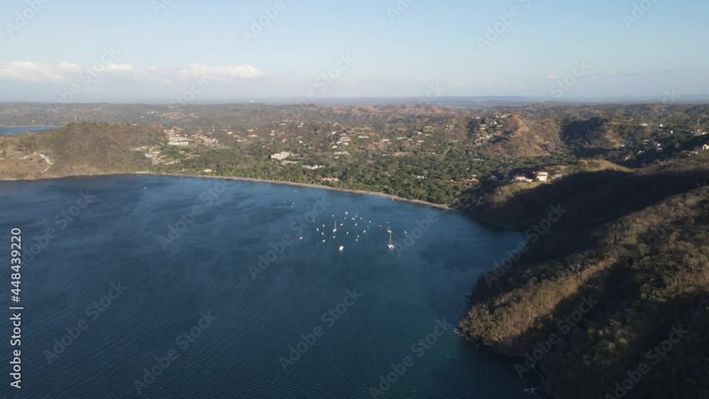 Bay with boats playa hermosa Costa Rica aerial sunset Costa Rica