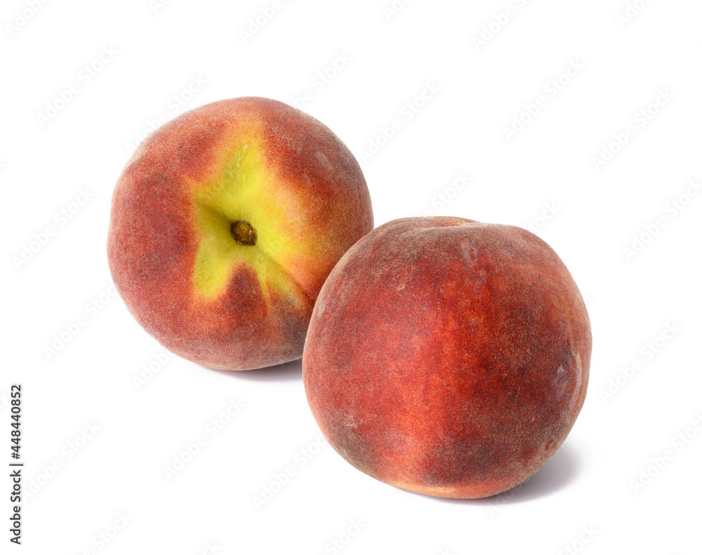 two ripe red peaches isolated on white background two ripe red peaches isolated on white background