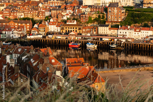 Whitby pier on sunrise photo