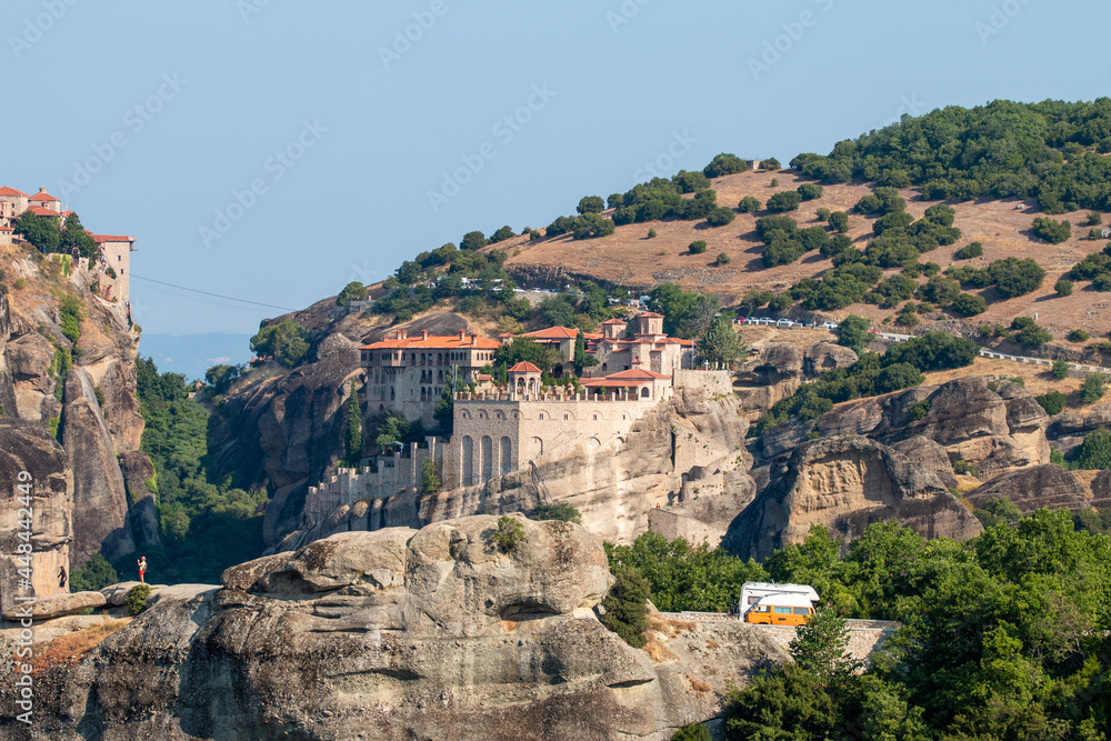 Monasteries built on cliffs, Meteora on a hot summer day, Greece