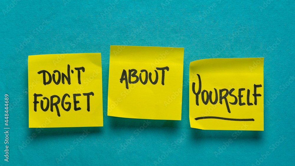 do not forget about yourself self care reminder - inspirational handwriting on yellow sticky notes against blue handmade paper, health and personal development concept do not forget about yourself self care reminder - inspirational handwriting on yellow sticky notes against blue handmade paper, health and personal development concept