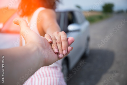 Couple holding hands in the car. Couple in love. Sensual. Happy day. Sensual. Photo. Background. 