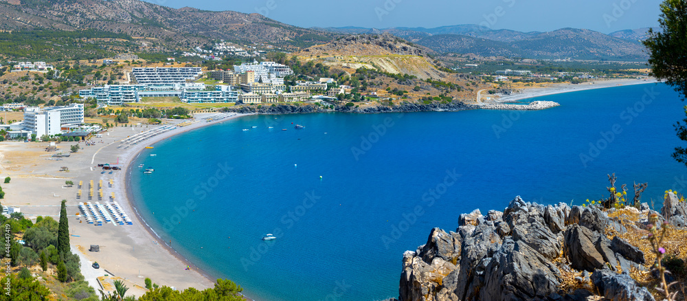 Vlycha Beach in closed bay near Lindos. Good place for for beach leisure and water attraction with worthful hotels. Vacation on Greece islands in Mediterranean sea. Lindos. East Rhodes. Greece