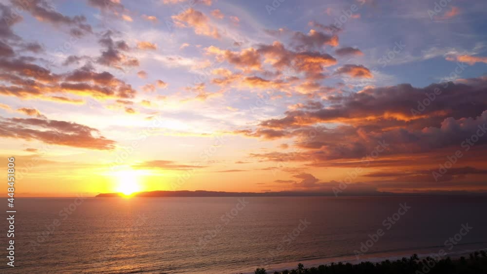 Aerial back traveling over Pavon bay Costa Rica beautiful fire sunset tropical environment biodiversity Aerial back traveling over Pavon bay Costa Rica beautiful fire sunset tropical environment biodiversity