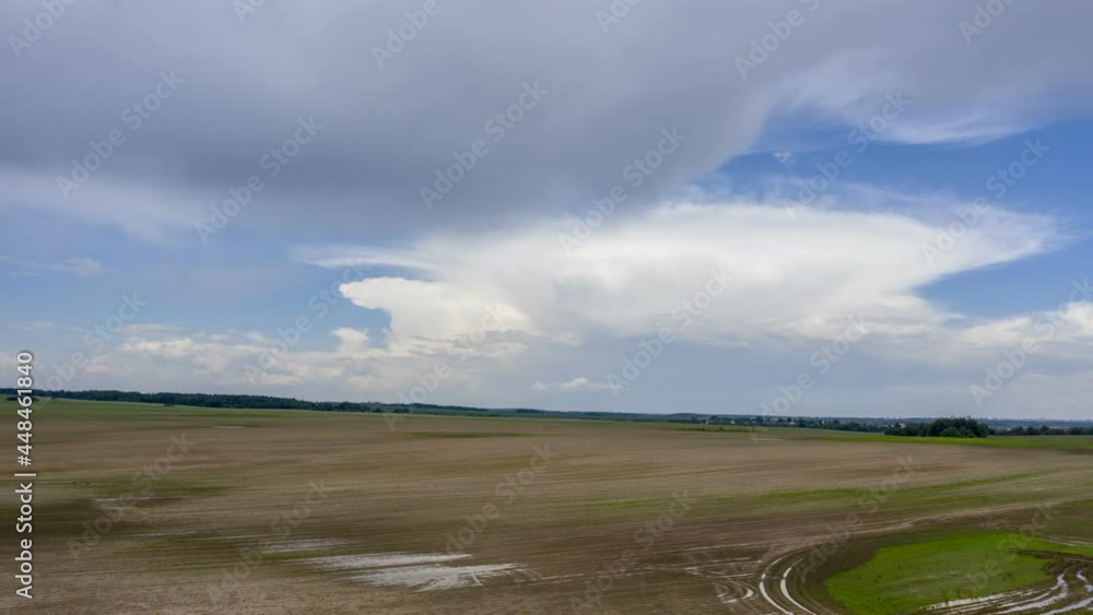 Aerial view of agricultural landscape with fields in summer season. Beautiful rural landscape in bird's-eye view, hyperlapse
Aerial view of agricultural landscape with fields in summer season. Beautiful rural landscape in bird's-eye view, hyperlapse
