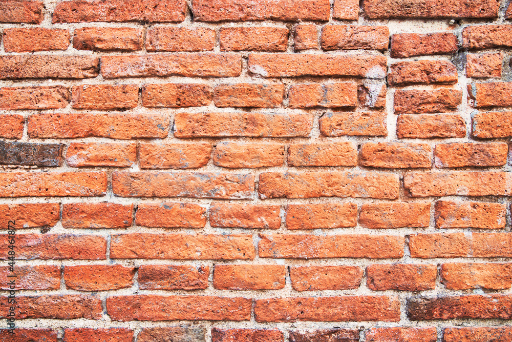 Brick wall texture with cracked tiles and cement. Classic brickwall surface background Brick wall texture with cracked tiles and cement. Classic brickwall surface background