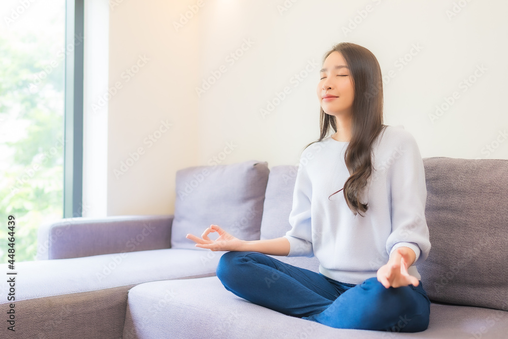 Portrait beautiful young asian woman meditation on sofa Portrait beautiful young asian woman meditation on sofa