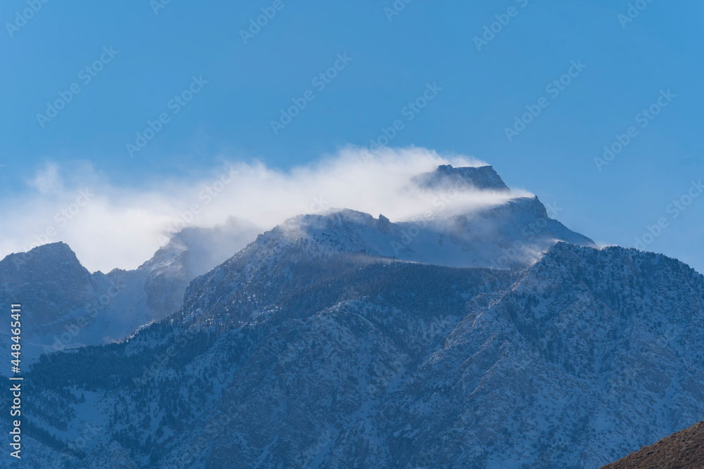 Snow and Wind on mountain peaks, Lone Pine Desert, California Snow and Wind on mountain peaks, Lone Pine Desert, California