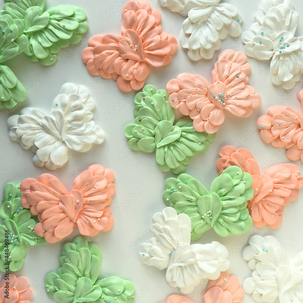 Stunning colored meringue butterflies in the form of flower petals - obrazy, fototapety, plakaty 