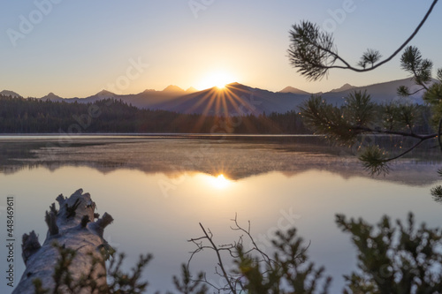 sunburst at sunrise in the sawtooth mountain range of central idaho