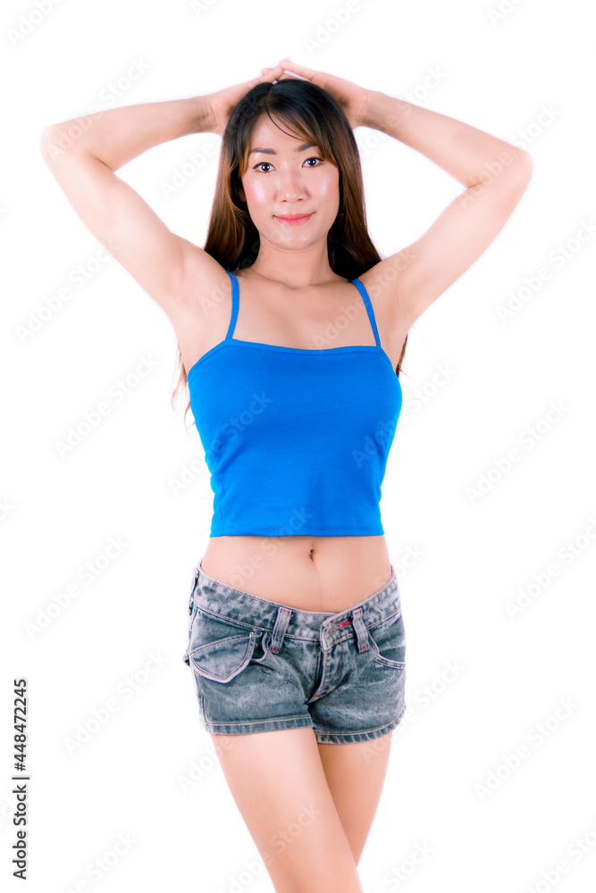 Asia young woman wearing a blue single line sexy dress on white background. Asia young woman wearing a blue single line sexy dress on white background.