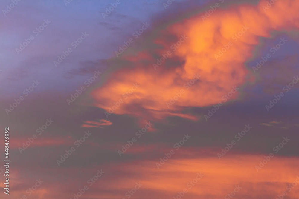 Colorful dramatic sky at sunset with pasted clouds late at night