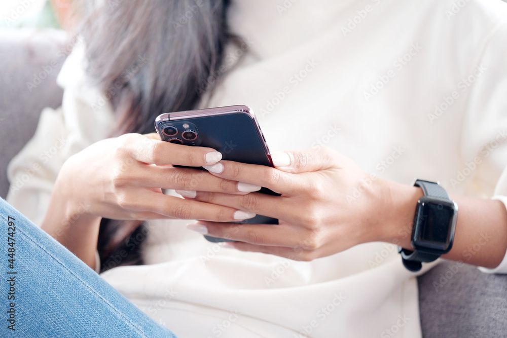 Close up of woman hand holding mobile phone , People on smart phone, technology lifestyle Close up of woman hand holding mobile phone , People on smart phone, technology lifestyle