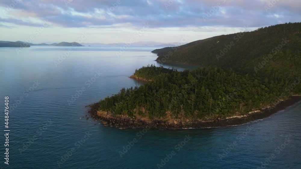 Panoramic View Of The Rocky Hook Island Covered With Green Woodland In Queensland, Australia. aerial Panoramic View Of The Rocky Hook Island Covered With Green Woodland In Queensland, Australia. aerial