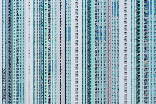 Exterior of high rise residential building of public estate in Hong Kong city © leeyiutung