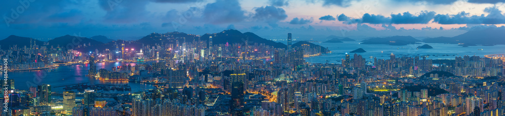 Panorama of aerial view of Hong Kong city at dusk