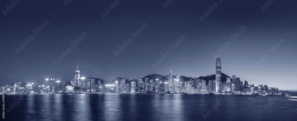 Naklejka premium Night scenery of panorama of Victoria harbor of Hong Kong city