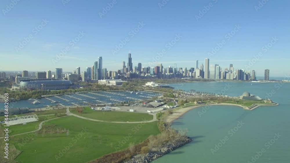 Drone tilt from lake shore on to Chicago skyline Drone tilt from lake shore on to Chicago skyline