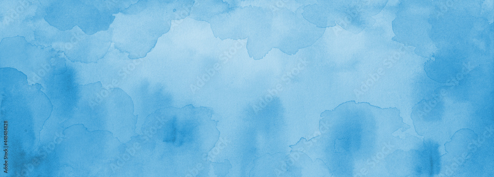 Light pastel blue watercolor background texture, painted blue blotches on the border Light pastel blue watercolor background texture, painted blue blotches on the border