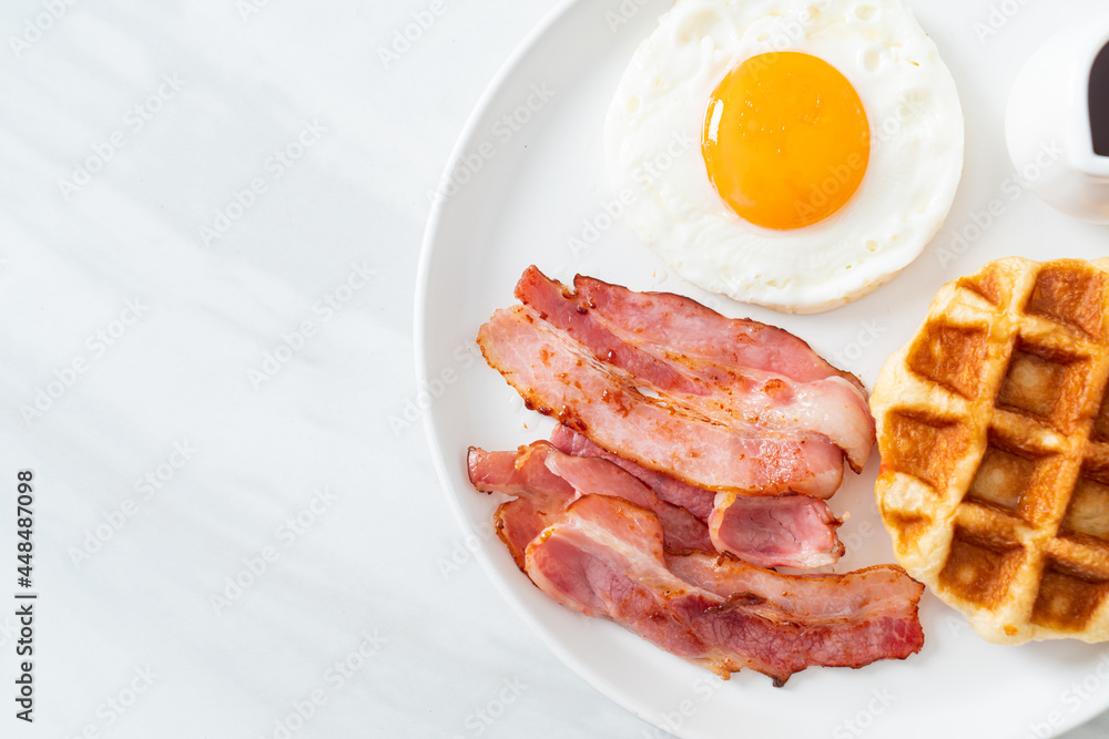 fried egg with bacon and waffle