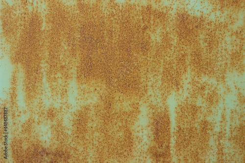 Old orange metal wall texture. Backdrop with interested pattern.