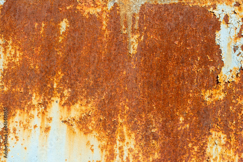 Rust.Old rusty metal background.An old blue metal wall with spots and streaks of rust.