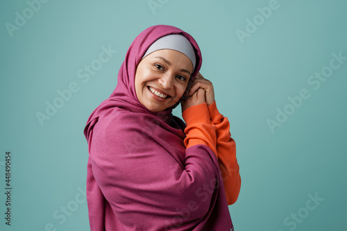 Portrait of a mature islamic woman wearing hijab © Drobot Dean