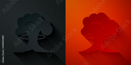 Paper cut Nuclear explosion icon isolated on black and red background. Atomic bomb. Symbol of nuclear war, end of world. Paper art style. Vector